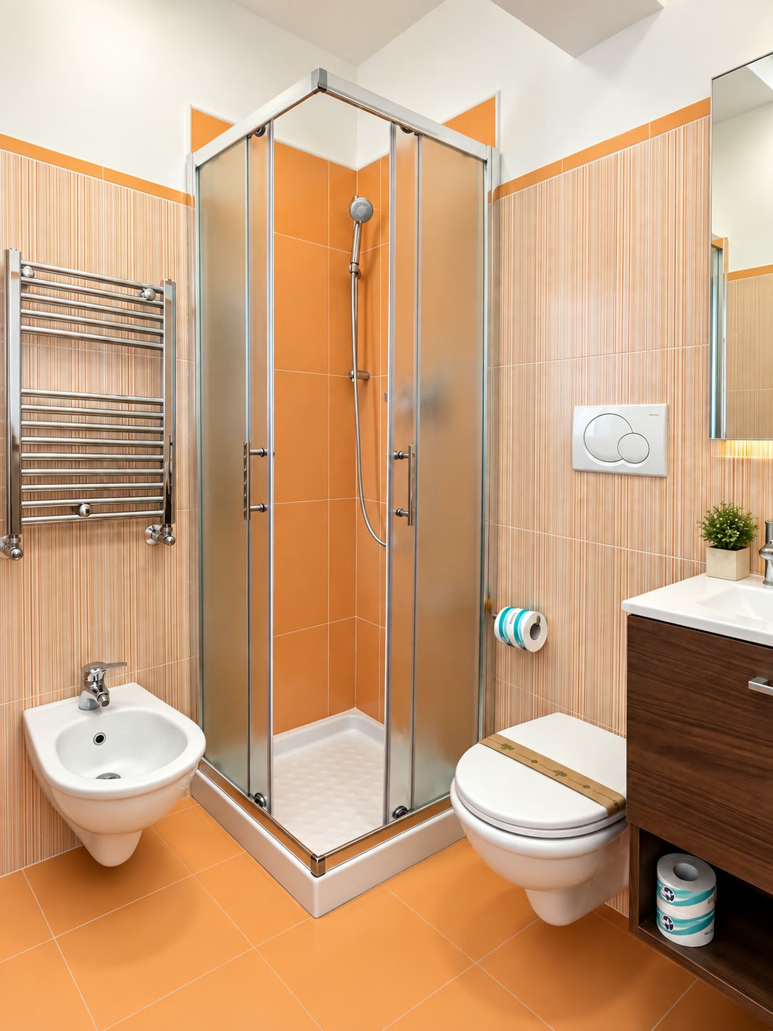 Bagno privato completo con doccia, lavabo, bidet e termoarredo
